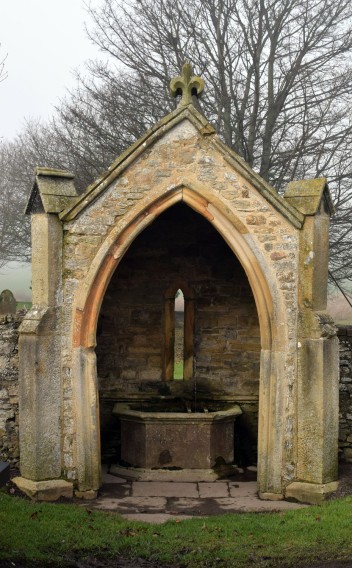Stanwick Church. Well in the enclosure wall